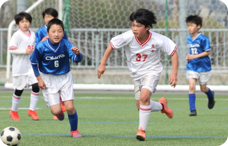 サッカークラブ試合風景